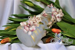 Frosted glass flower vase with magnolia
